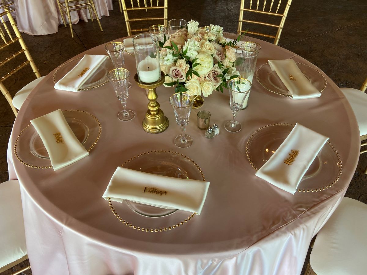Napkins Satin Ivory on 120" Round Matte Satin Blush Tablecover